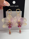 Pendientes Dorados con Flor Real Orquídea Morada | JOYERÍA BOTÁNICA |