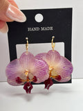Pendientes Dorados con Flor Real Orquídea Morada | JOYERÍA BOTÁNICA |